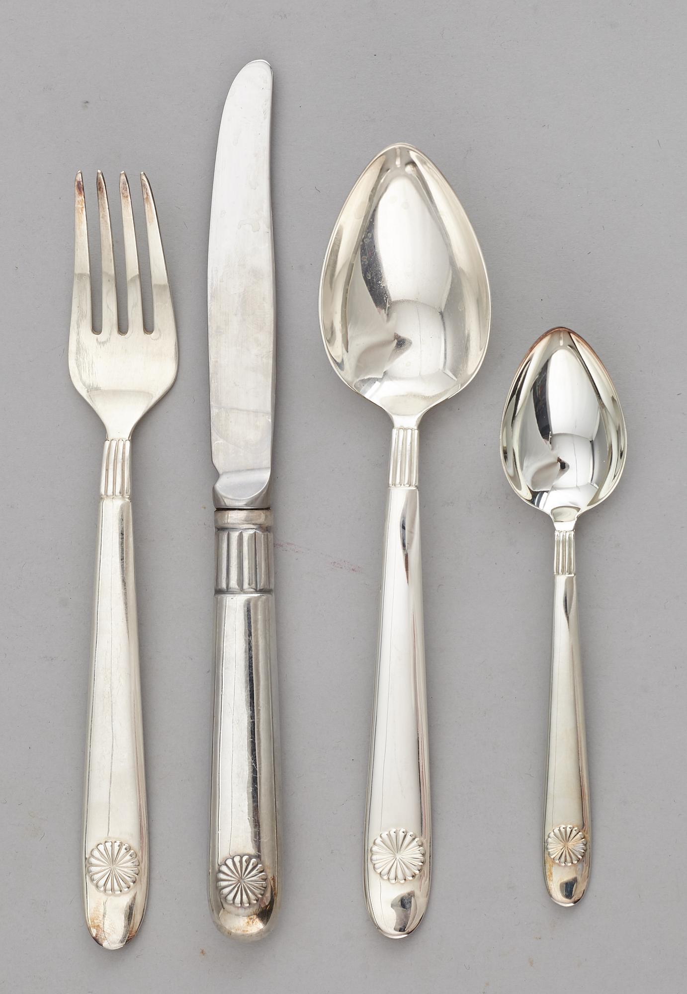 A Sigvard Bernadotte  service, Millenium design, 2000. (175 porcelain pieces and 96 cutlery pieces).