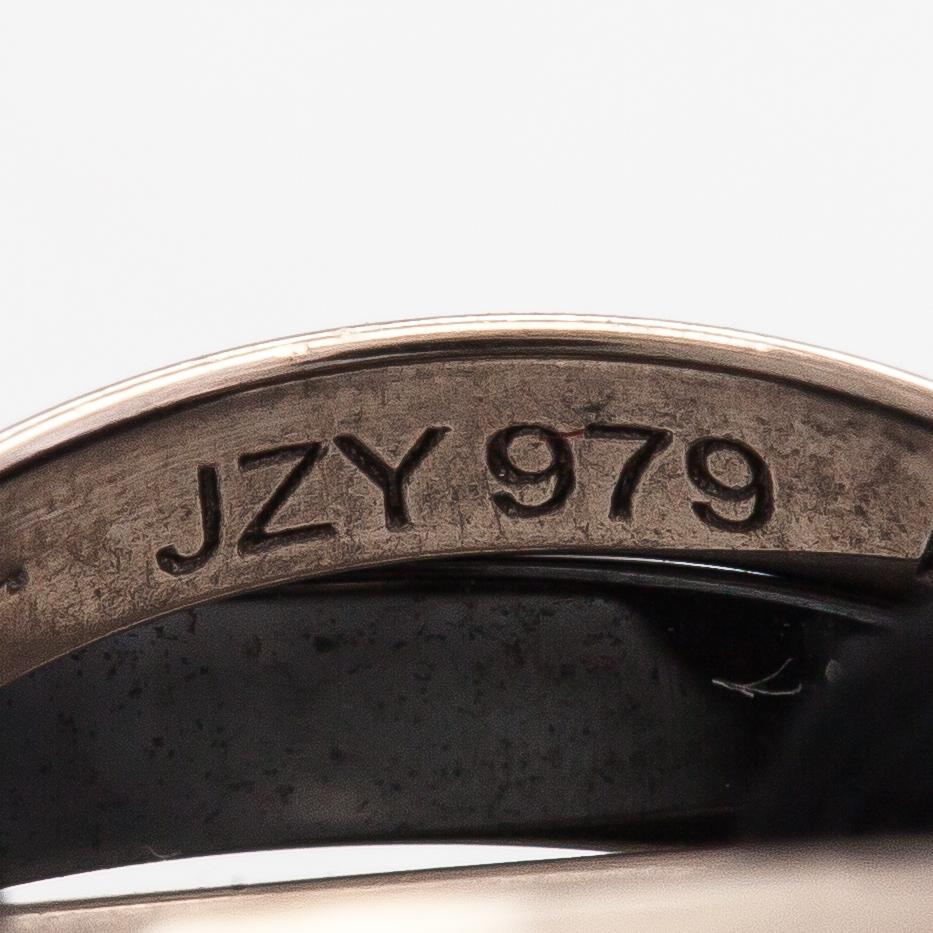 Cartier, A "Trinity" bracelet made of 18K white gold, ceramic and textile. Marked Cartier, JZY979.