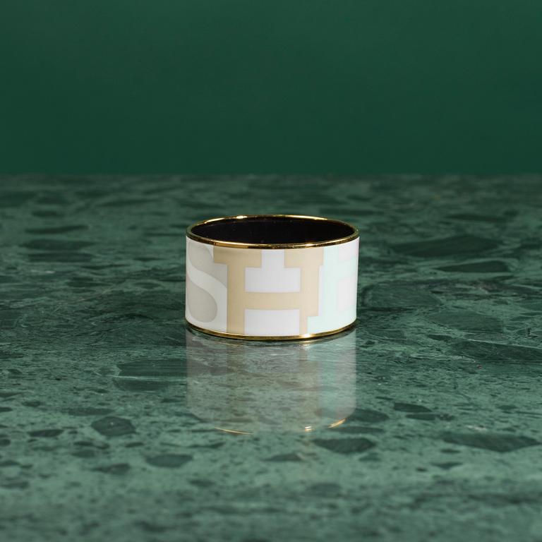 A Hermès enamel bracelet.