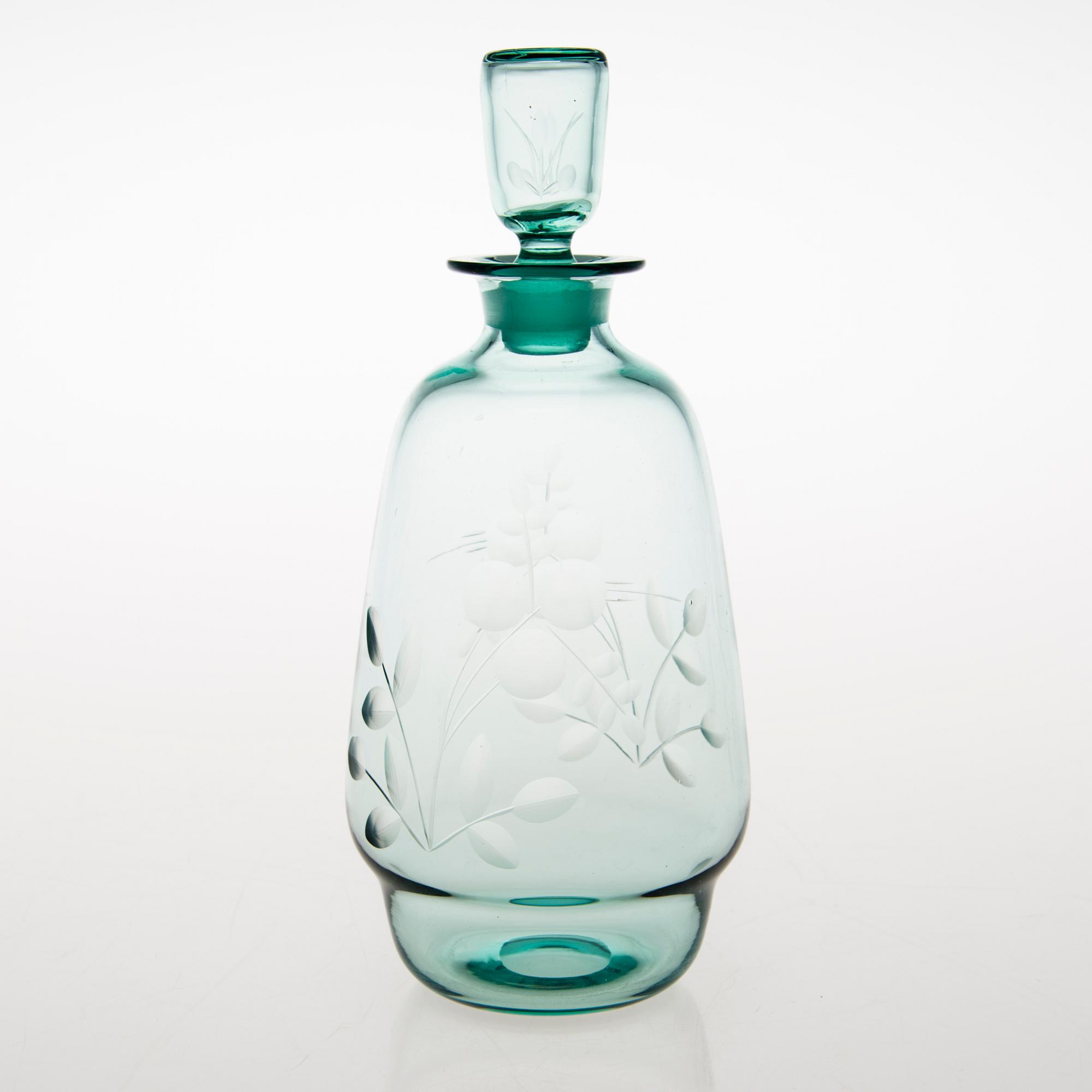 A set of five drinking glasses and a carafe from 1930s.