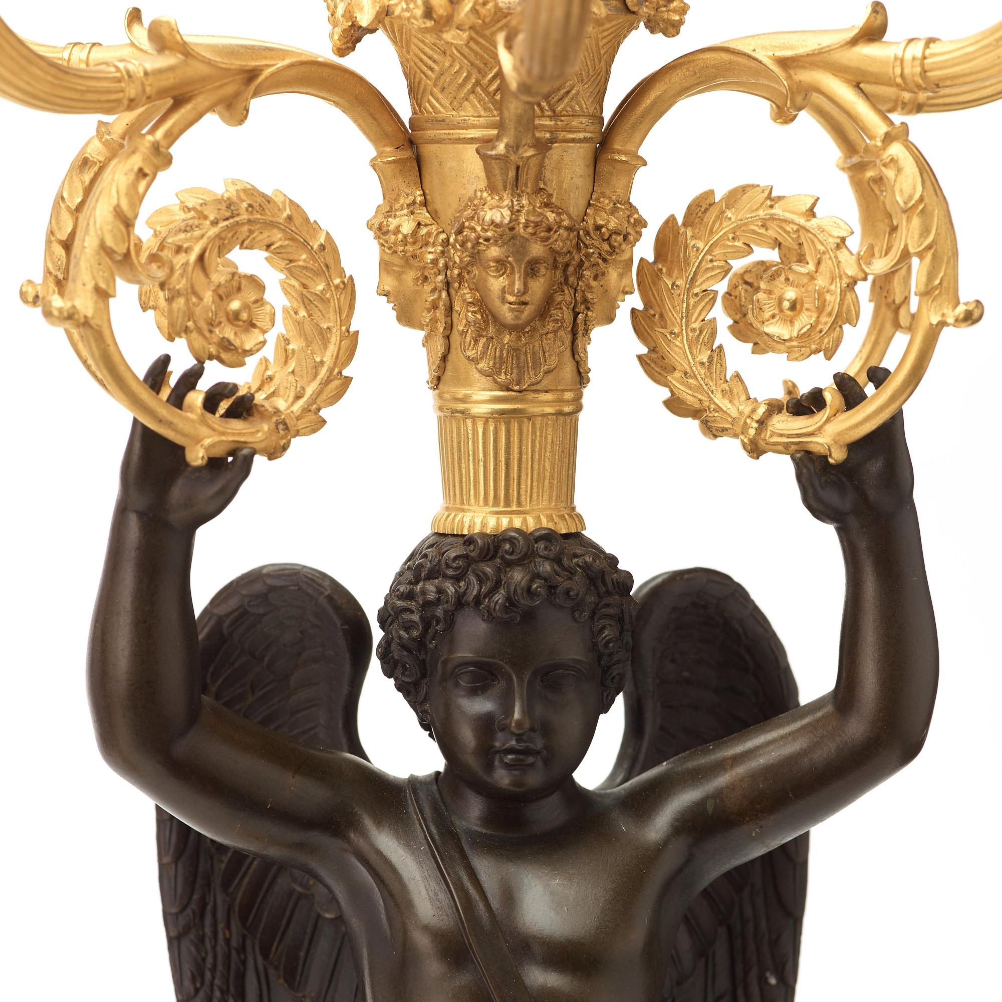 KANDELABRAR, för sex ljus, ett par, av Chibout, Parisarbeten, omkring år 1820.