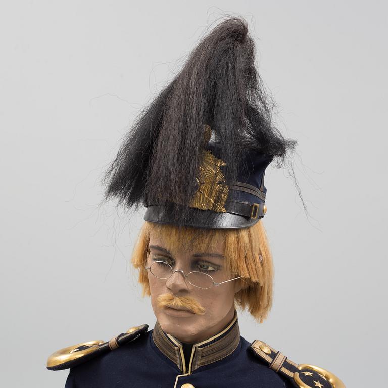 A mannequin with a Swedish military uniform m/1886 for officer of Värmland Regiment.
