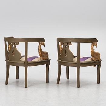 A pair of Empire-style armchairs with an end table, second half of the 20th century.