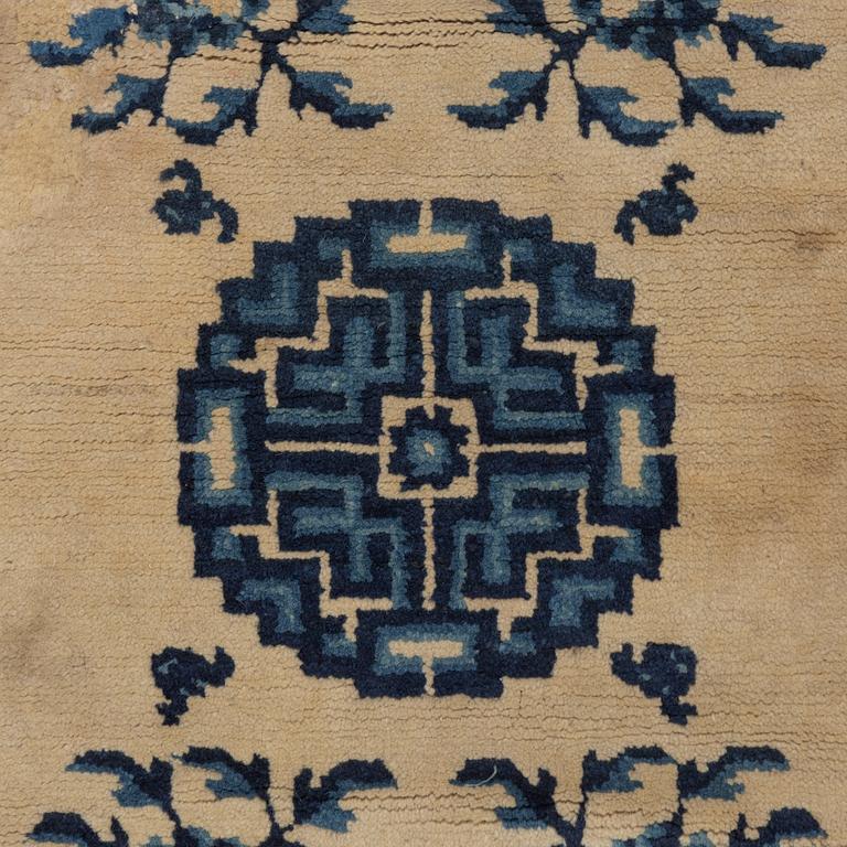 Two antique Chinese Pao-Tow rugs, c. 125 x 65 and 125 x 60 cm.