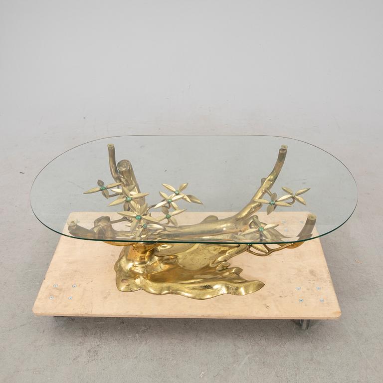 A brass and glass coffee table from the second half of the 20th century.
