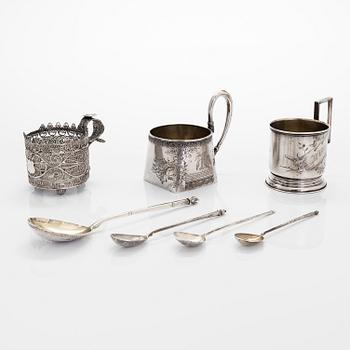 Three silver tea glass holders and four spoons, silver Kostroma and Moscow, late 19th and early 20th centuries.