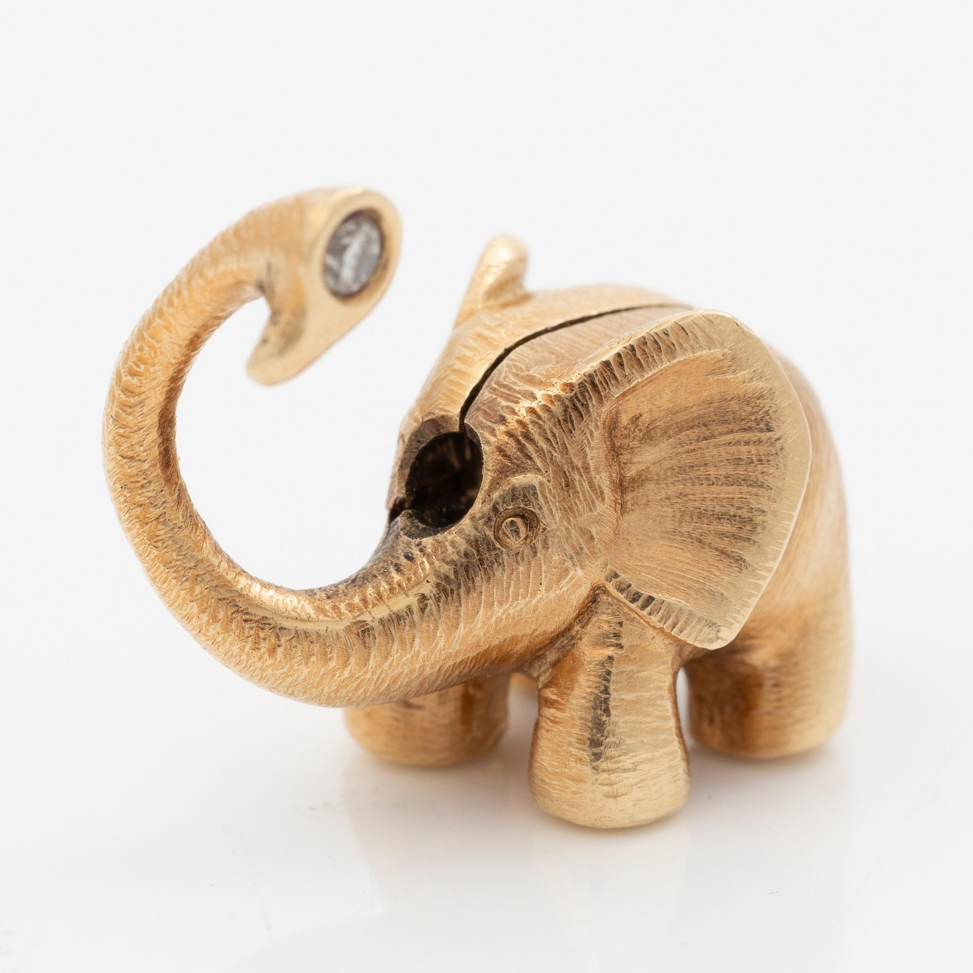 Ole Lynggaard lås/hänge i form av en elefant 14K guld med en rund briljantslipad diamant.