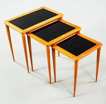 An nest of table of three pieces from the second half of the 20th century.