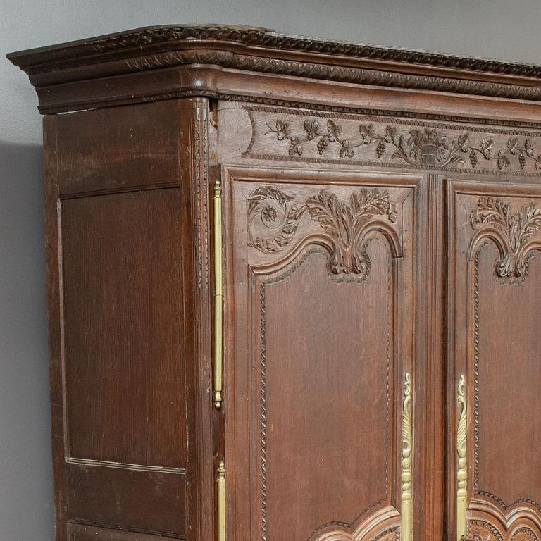 A french carved wooden cabinet, around 1900.