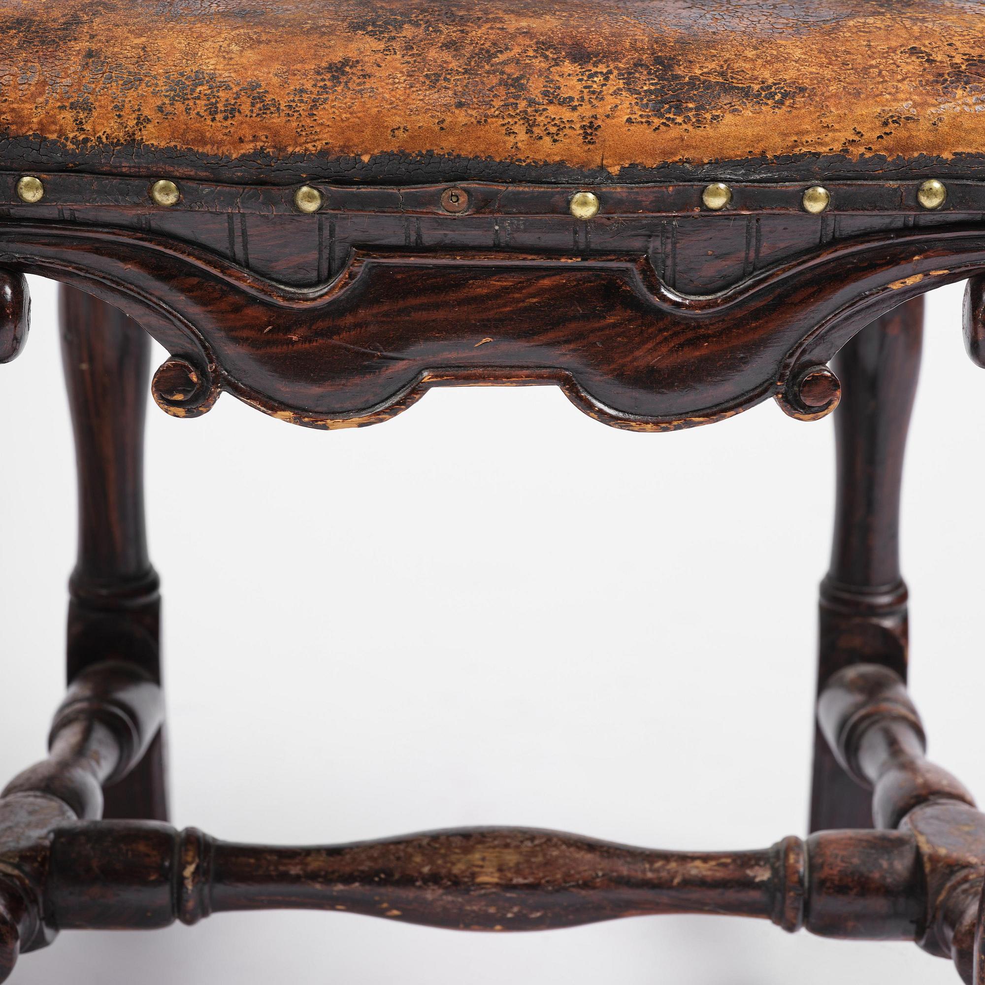A pair of late baroque faux bois-painted chairs, attributed to M. Meling, 1730/40's.