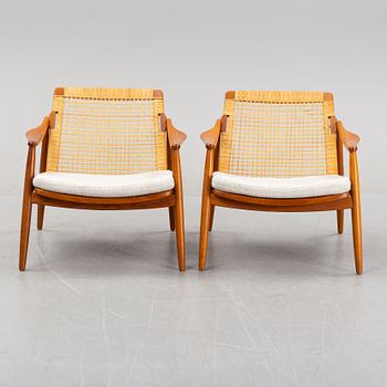 Hartmuth Lohmeyer, a pair of teak and rattan easy chairs, Gemla, Diö, 1950's/60's.