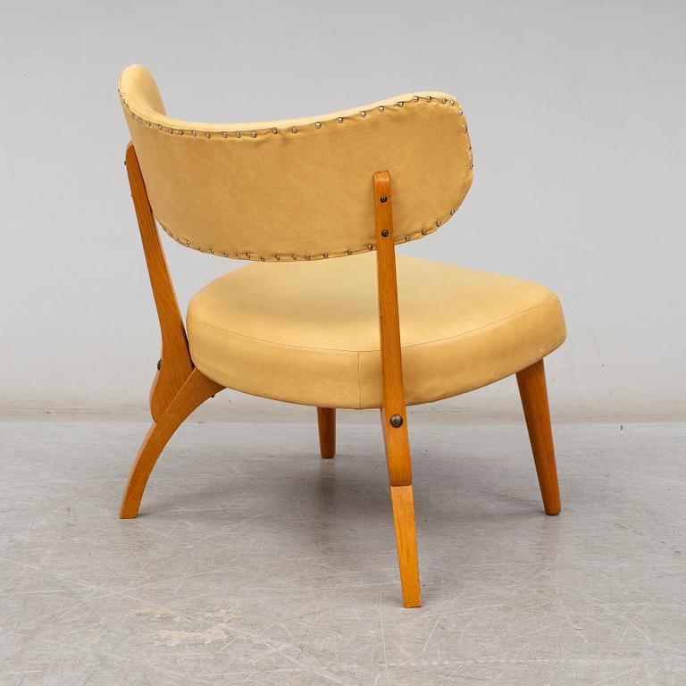 an armchair from the mid 20th century.