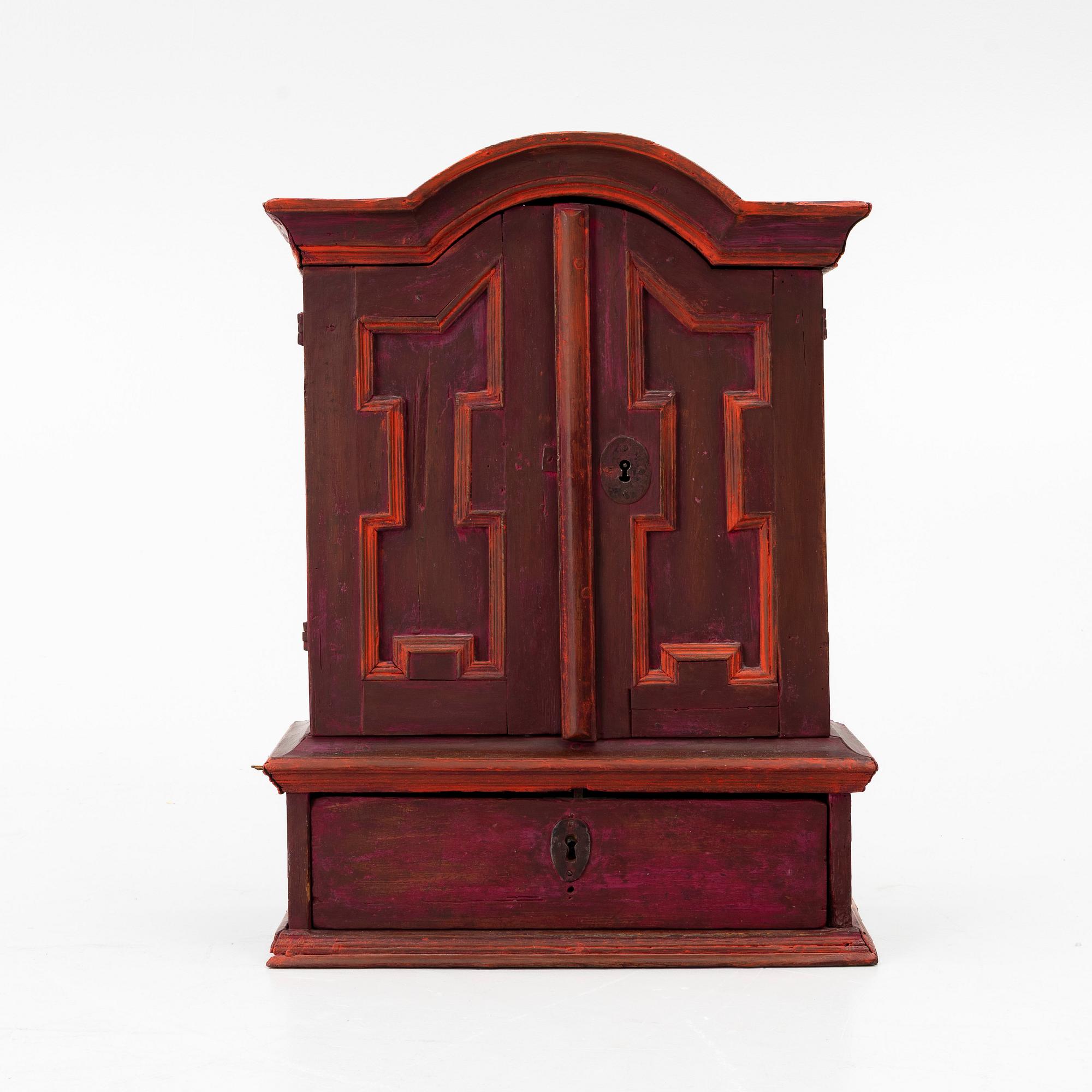 A 18th century Swedish wall-hanged cabinet.