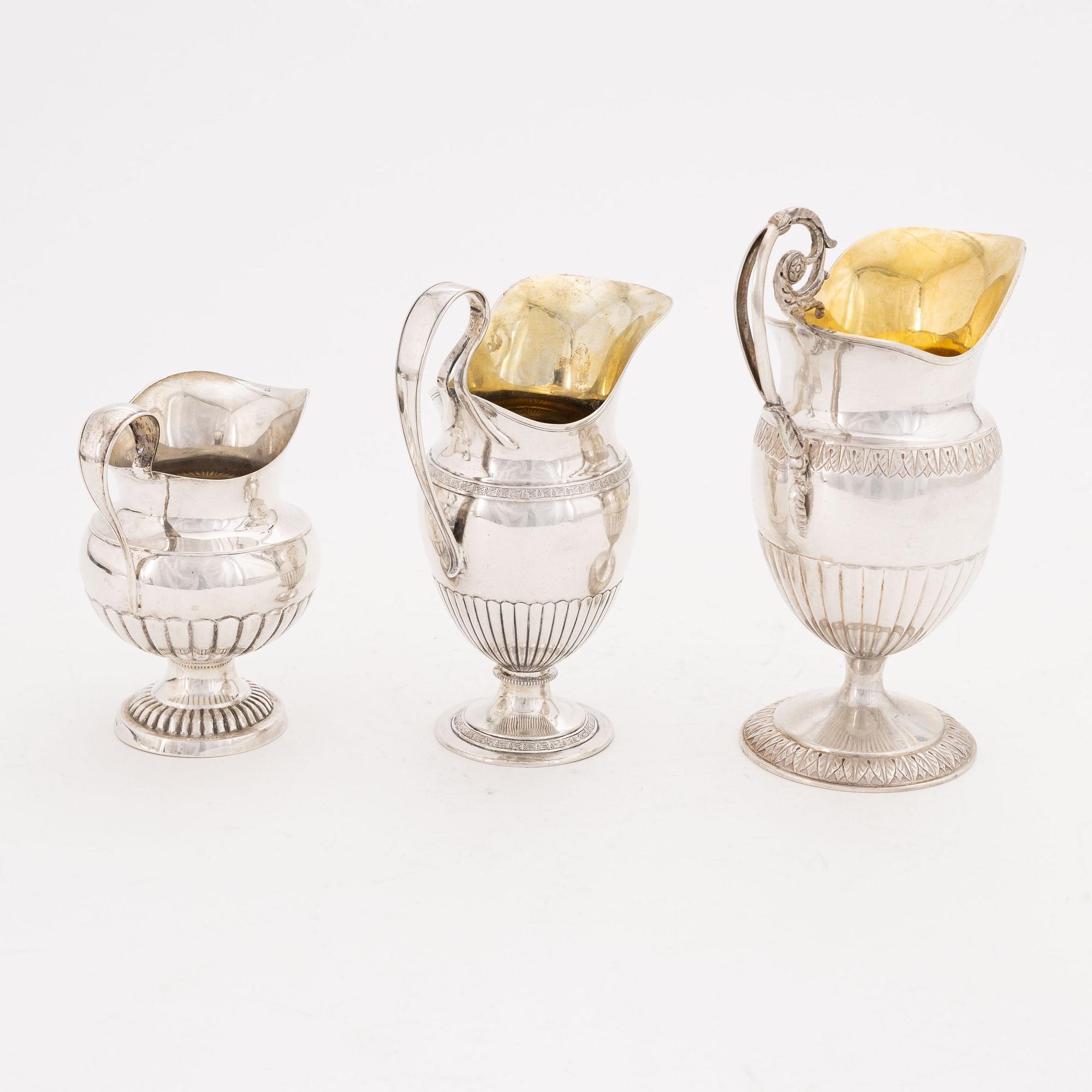 A set of three Swedish silver Empire jugs, first part of the 19th Century.