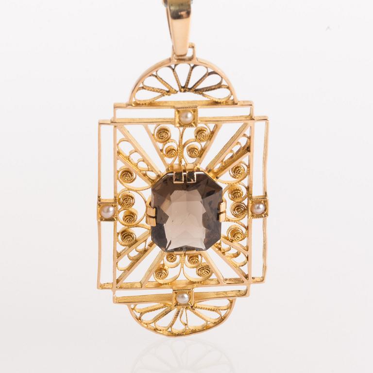 HÄNGE, 18K guld med rökkvarts samt pärlor. Guldvaruaktiebolaget, Malmö, 1930.