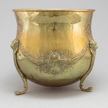 An 18th century brass flower pot.