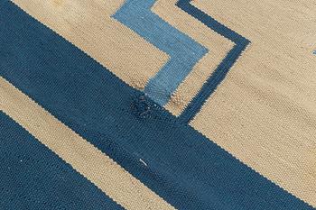 A flat weave carpet, Sweden, dated 1936, c. 370 x 260 cm.