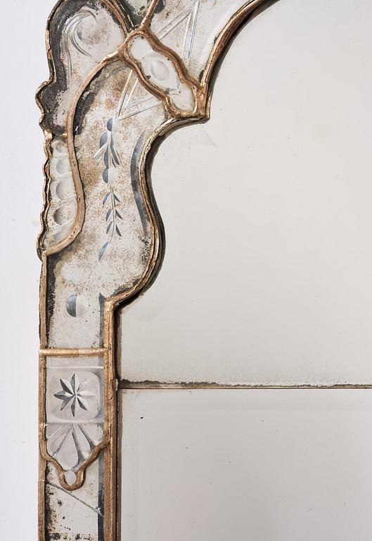 A Northern European late baroque mirror, mid 18th century.