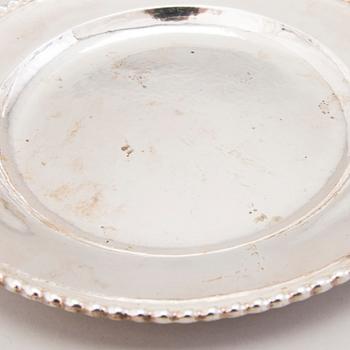 A tray and a set of 12 dishes in silver, mark of C.G. Hallberg, Stockholm 1928.