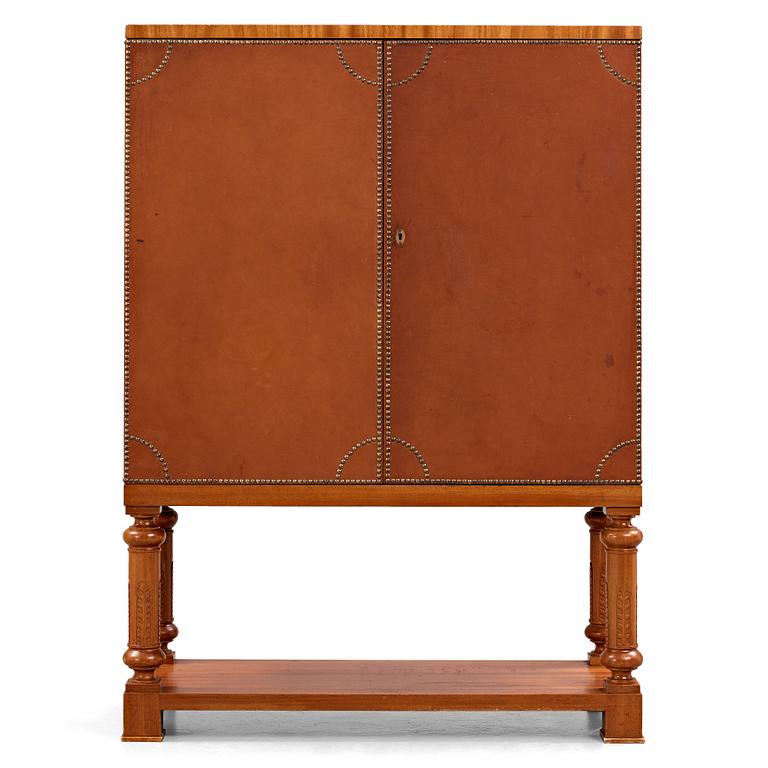 Otto Schulz, Boet, Gothenburg, probably, a cabinet covered with brown leather, dated 1942.