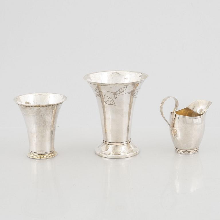 Two silver beakers and a silver creamer, 19th century, Finland.