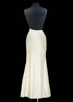 A white silk evening skirt by Christian Dior, spring 1952.