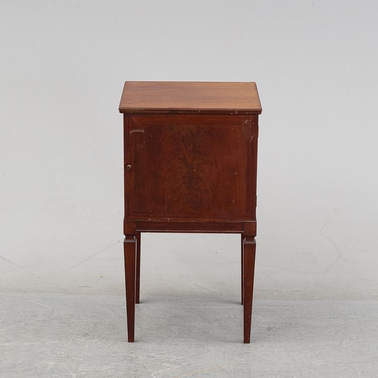 A mahogany bedside cabinet by Carl Johanssons Möbleringsaffär, around the year 1900.