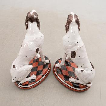 Decorative sculptures a pair England 20th century glazed ceramics.