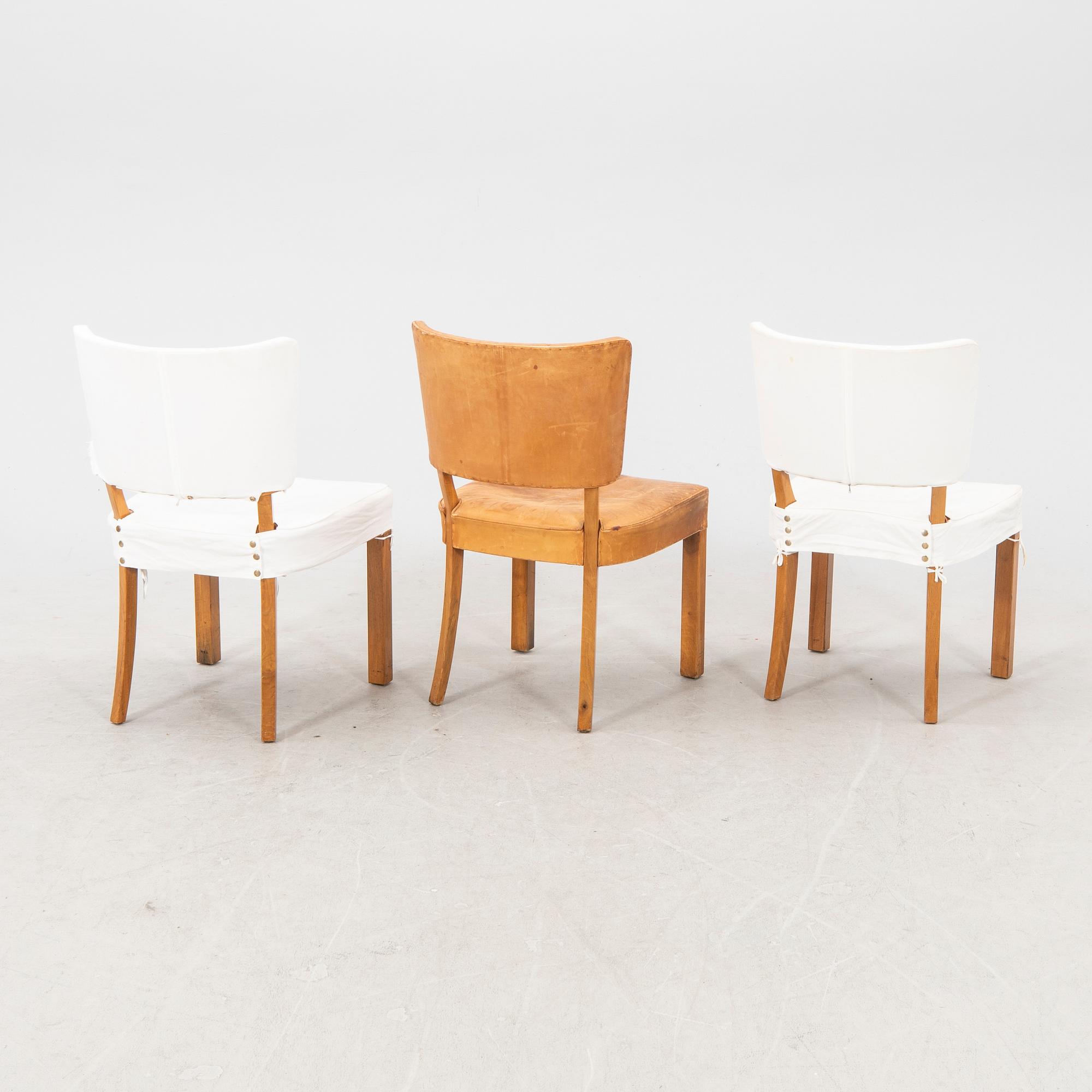 A set of seven + one leather chairs from Mobilia Malmö mid 1900s.