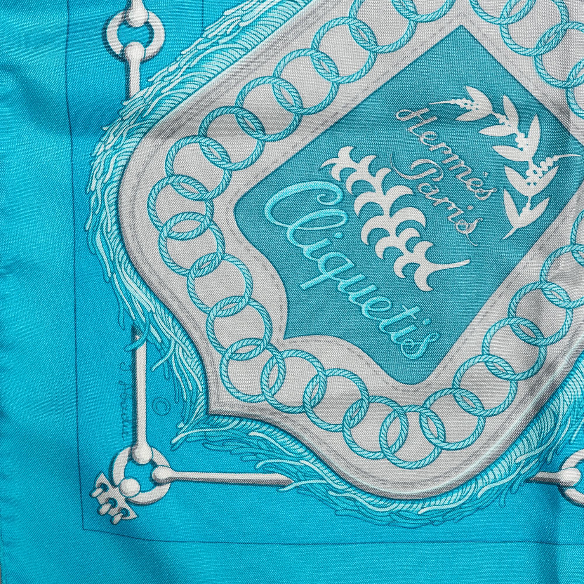 Hermès, a 'Cliquetis' silk scarf.