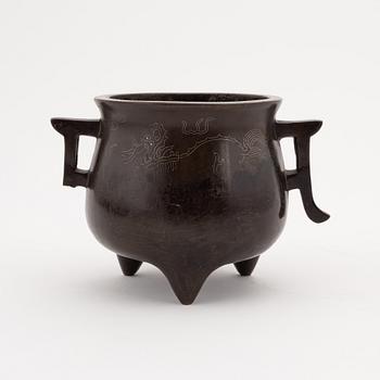 A Chinese tripod bronze censer, 20th century.