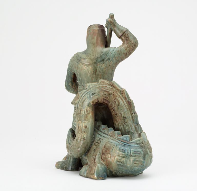 A Gunnar Nylund stoneware sculpture of S:t Michael and the dragon, Rörstrand.