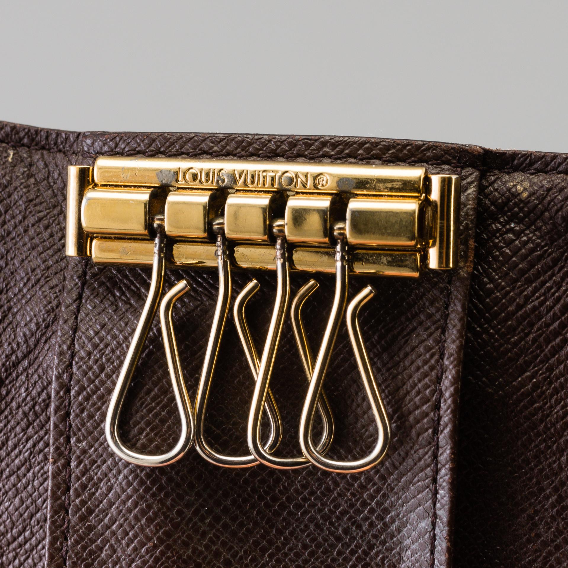 two LOUIS VUITTON keyholders.