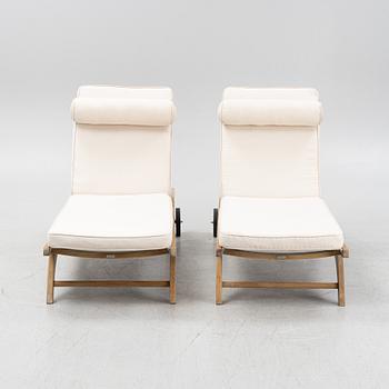 A pair of 'Columbus Sunbed' teak deck chairs, Skagerak, Denmark.