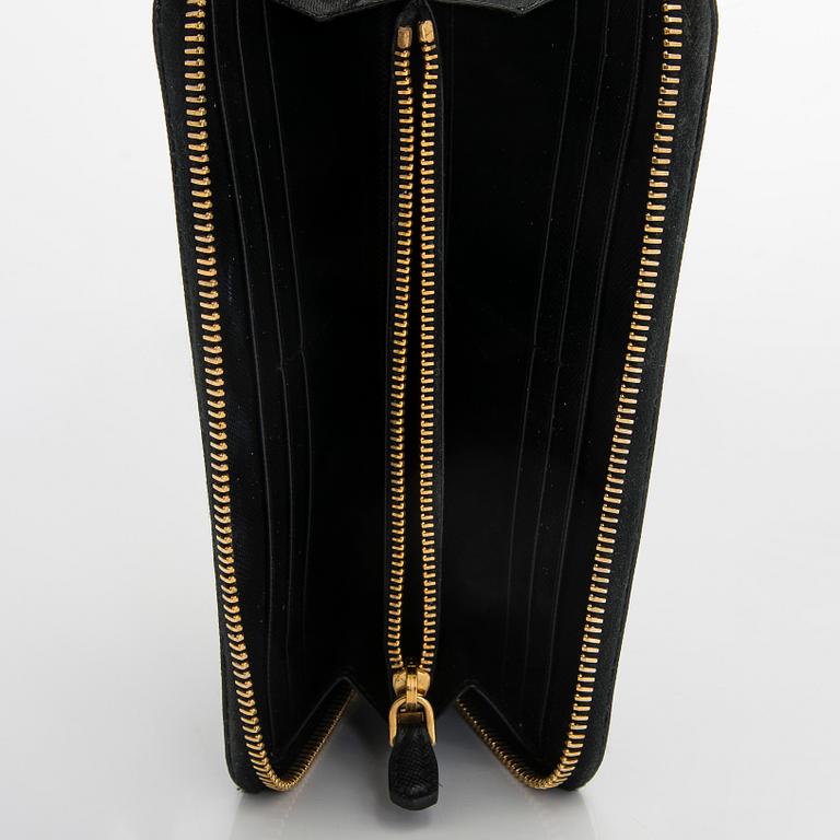 Prada, a wallet.