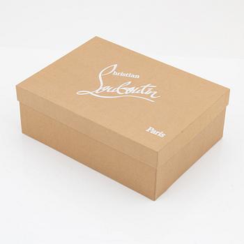 Christian Louboutin, a pair of black leather peep toe pumps, size 37 1/2.