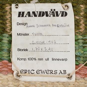 A CARPET, flat weave, ca 247 x 167,5 cm, signed AJA.