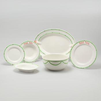 A 20th century set of earthenware tableware of 21 pcs by Gustavsberg.