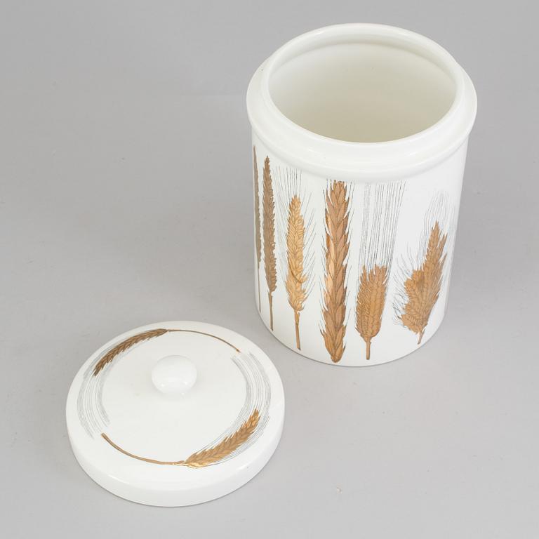 A porcelain jar with lid from Fornasetti, Italy.
