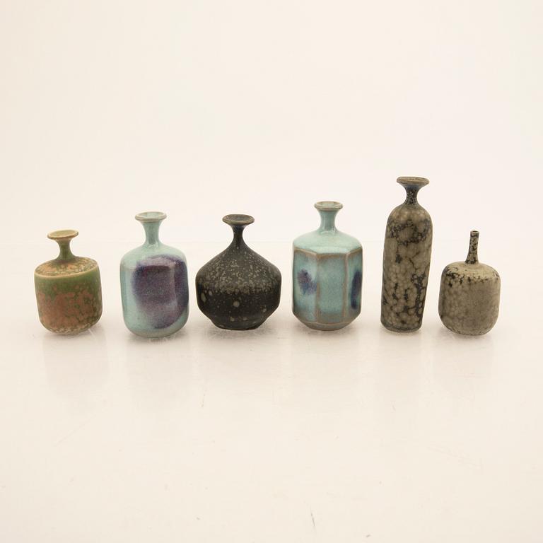 Rolf Palm, a set of six signed miniature vase stoneware.