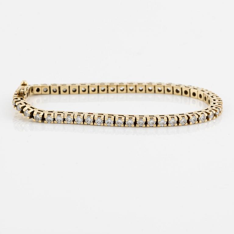 Tennis bracelet, 18K gold with brilliant-cut diamonds.