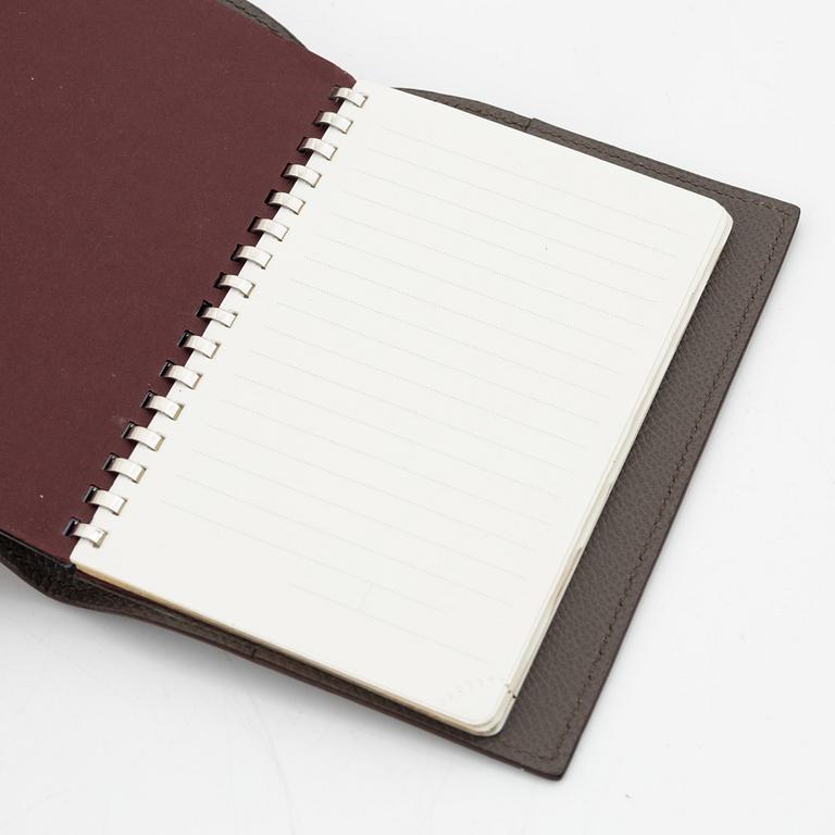 Hermès, notebook with leather case.