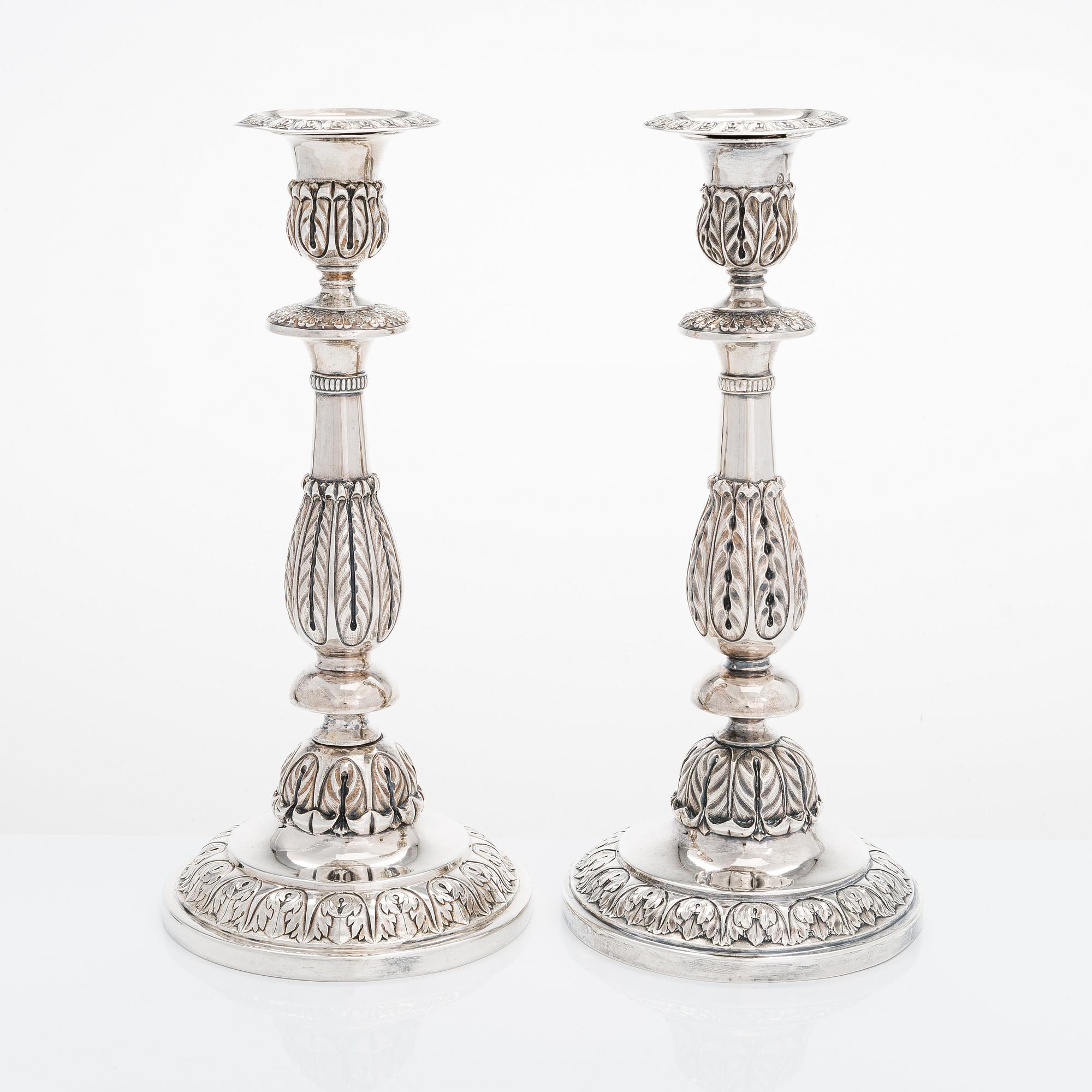 A pair of Russian silver candlesticks, maker's mark of Carl Johan Heyne, Saint Petersburg 1825.