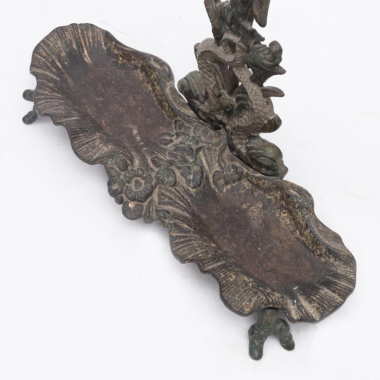 A umbrella stand, circa 1900.