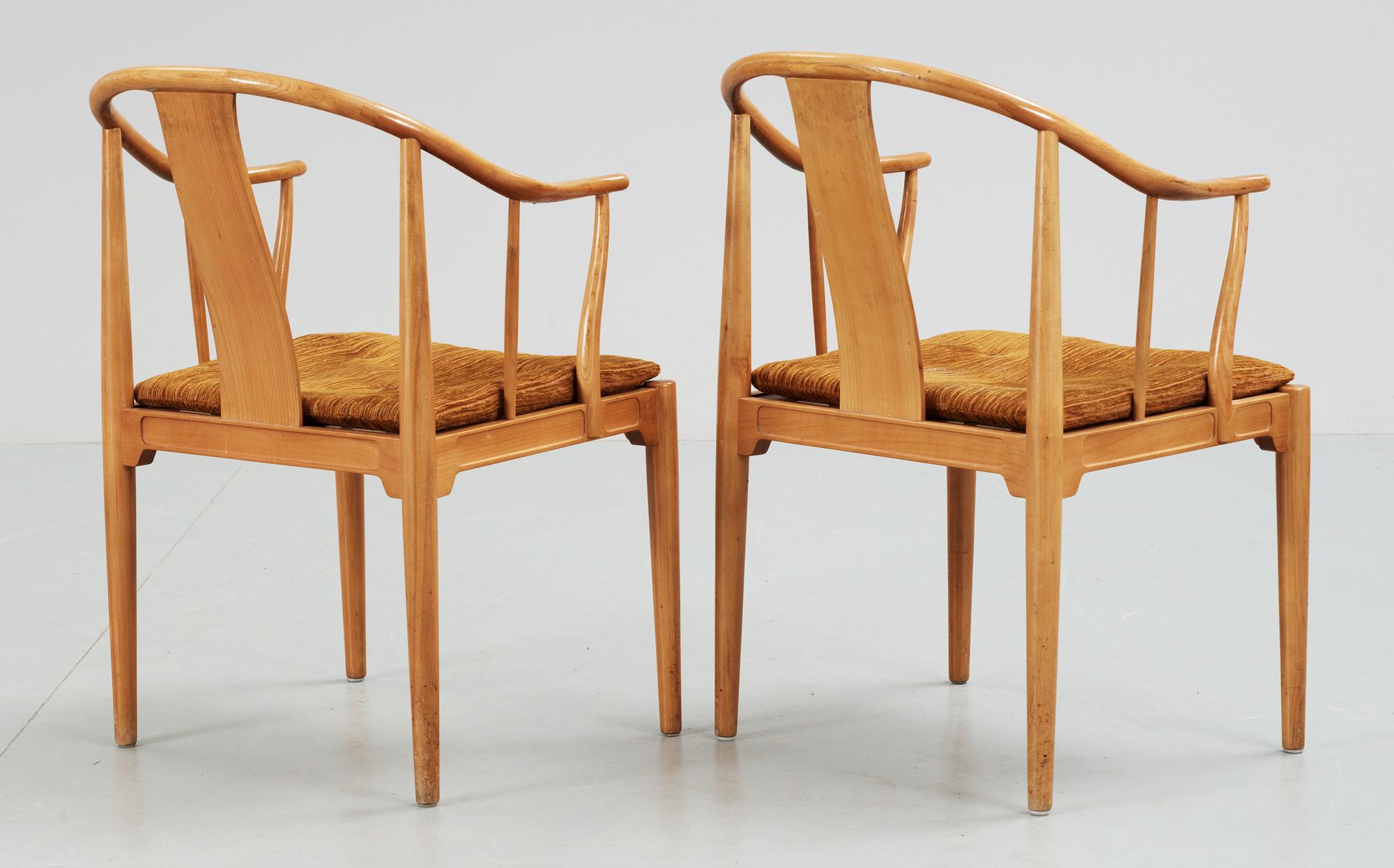 A pair of Hans J Wegner cherrywood 'China' armchairs, Fritz Hansen, Denmark 1966.