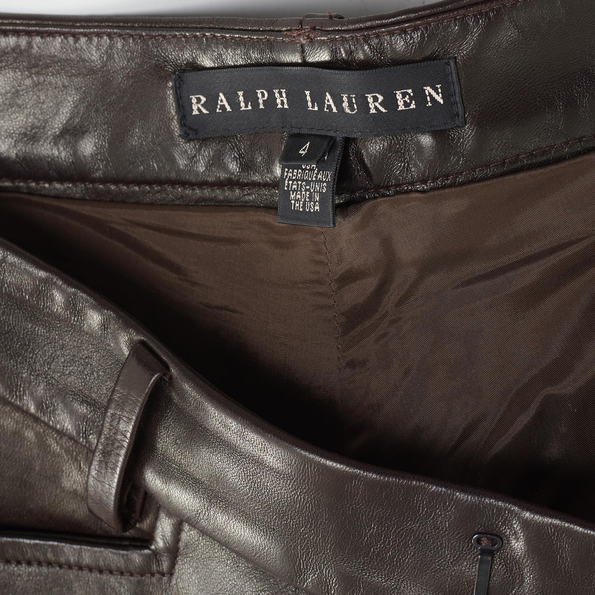 Apair of dark brown leather pants by ralph lauren.