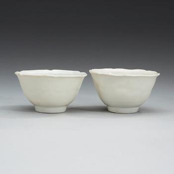 A pair of white glazed bowls, Ming dynasty, with Chenghua six character mark.
