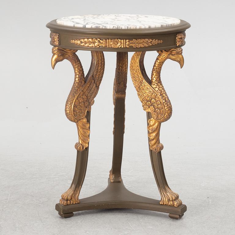 A pair of chairs and a side table, second half of the 20th century. Empire style.