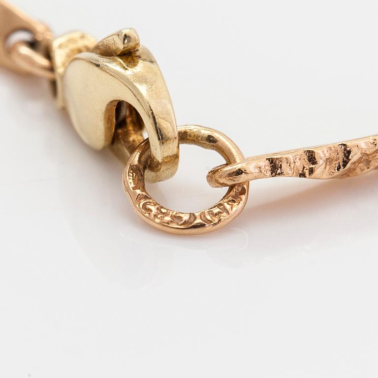 Necklace, 14K gold with a 0.01 ct diamond. Finnish hallmarks.