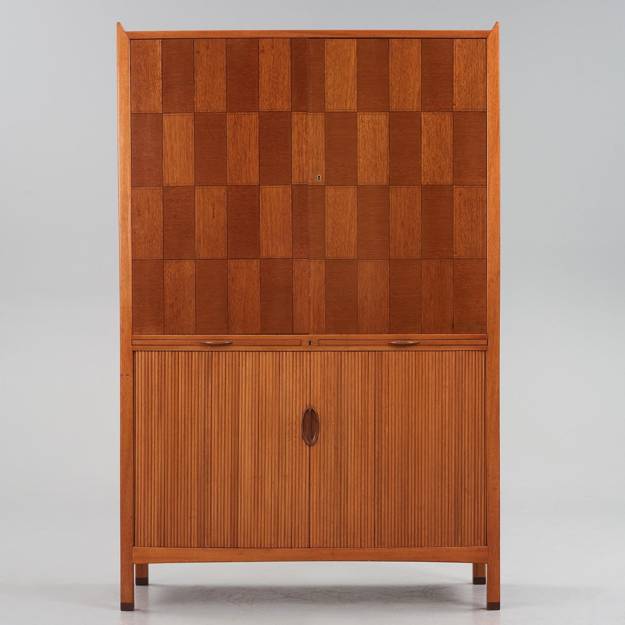 David Rosén, a mahogany and teak cabinet, for Stockholm's Association of Crafts, signed and dated 1959.